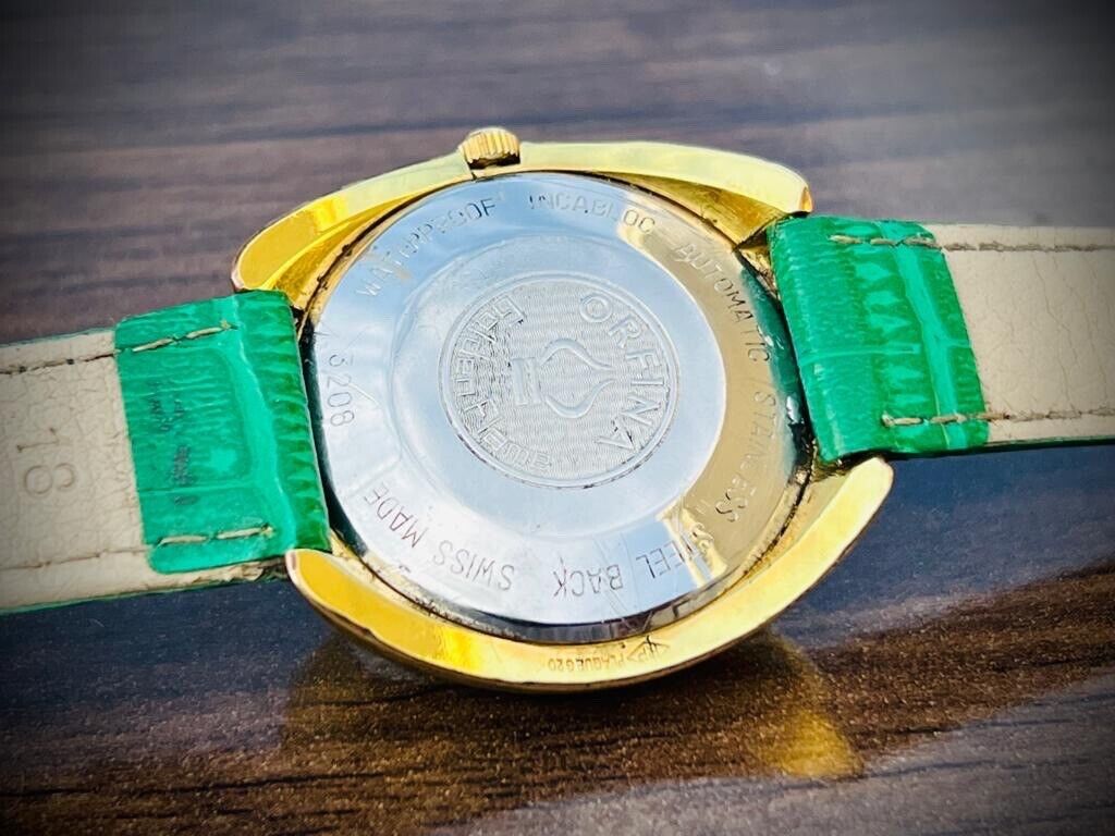 Vintage Orfina Golden Flame Emerald Green Dial Automatic Mens Swiss Watch 39mm - Grab A Watch Co