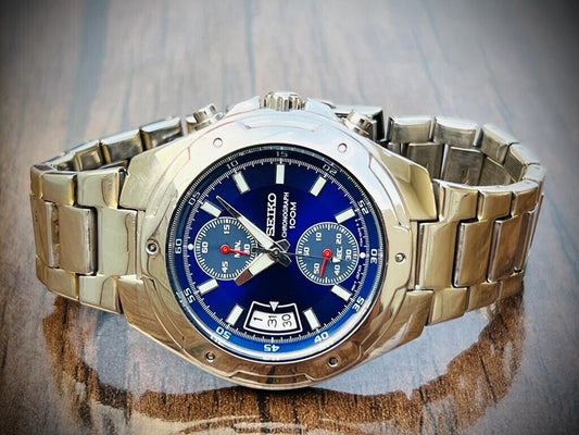 VINTAGE SEIKO 100m BLUE DIAL QUARTZ CHRONOGRAPH GENTS WRIST WATCH 7T94-0AN0 - Grab A Watch Co