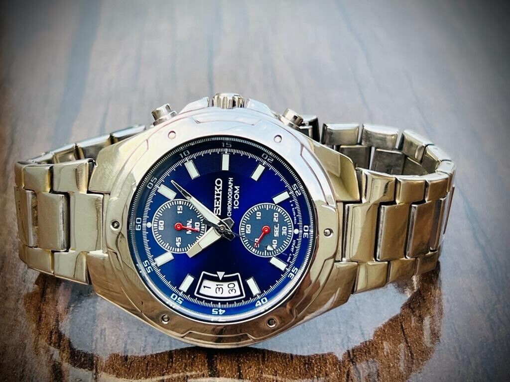 VINTAGE SEIKO 100m BLUE DIAL QUARTZ CHRONOGRAPH GENTS WRIST WATCH 7T94-0AN0 - Grab A Watch Co
