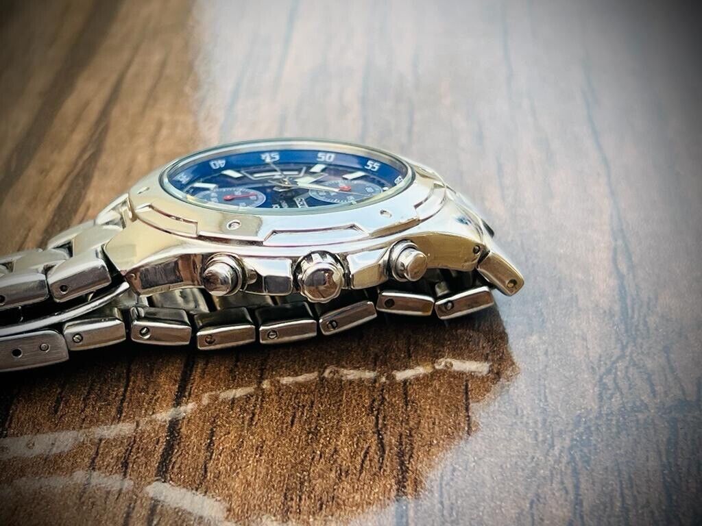 VINTAGE SEIKO 100m BLUE DIAL QUARTZ CHRONOGRAPH GENTS WRIST WATCH 7T94-0AN0 - Grab A Watch Co