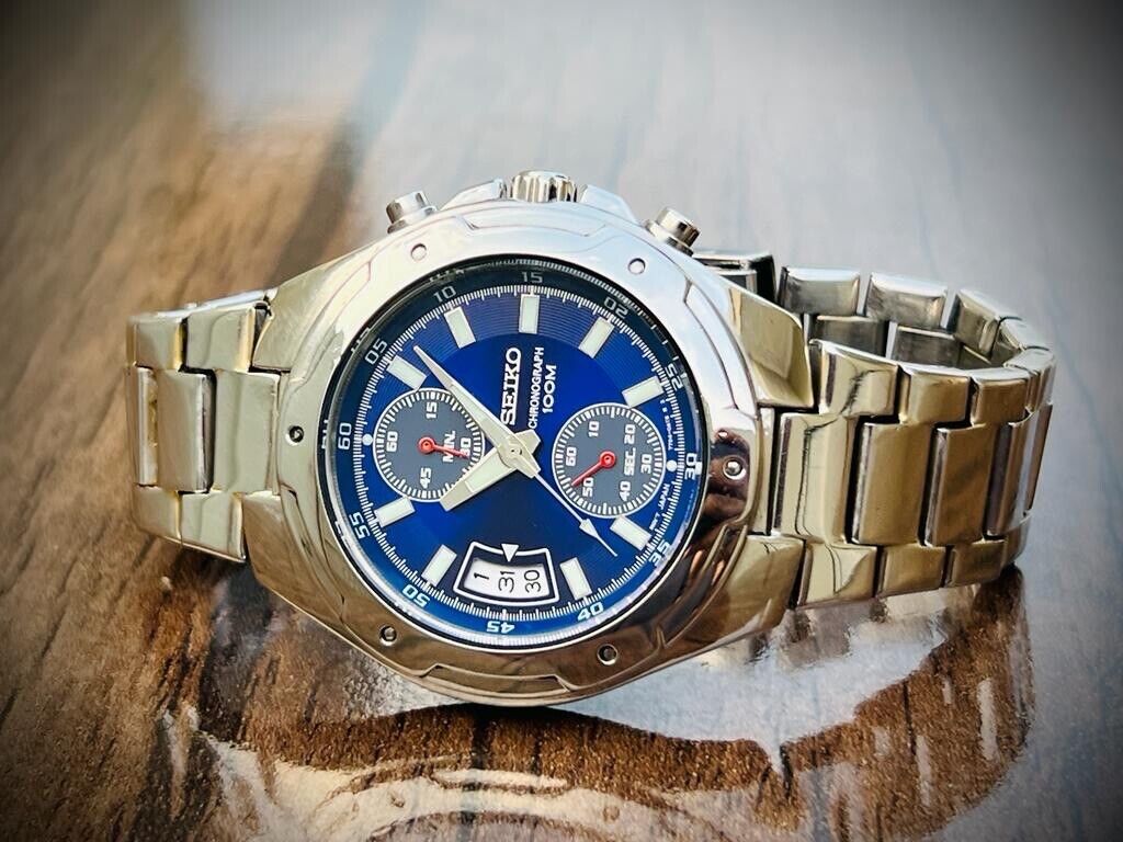 VINTAGE SEIKO 100m BLUE DIAL QUARTZ CHRONOGRAPH GENTS WRIST WATCH 7T94-0AN0 - Grab A Watch Co