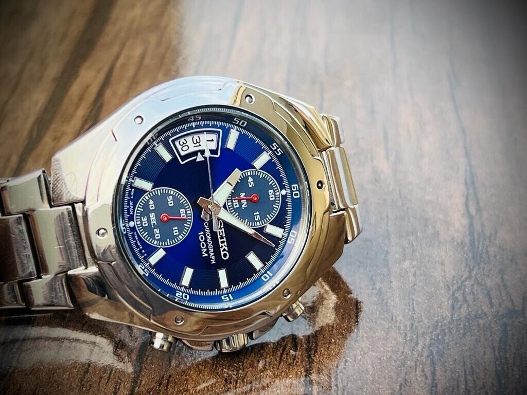 VINTAGE SEIKO 100m BLUE DIAL QUARTZ CHRONOGRAPH GENTS WRIST WATCH 7T94-0AN0 - Grab A Watch Co