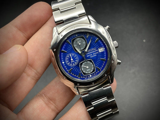 VINTAGE SEIKO 100m BLUE DIAL QUARTZ CHRONOGRAPH GENTS WRIST WATCH, Japan Made - Grab A Watch Co