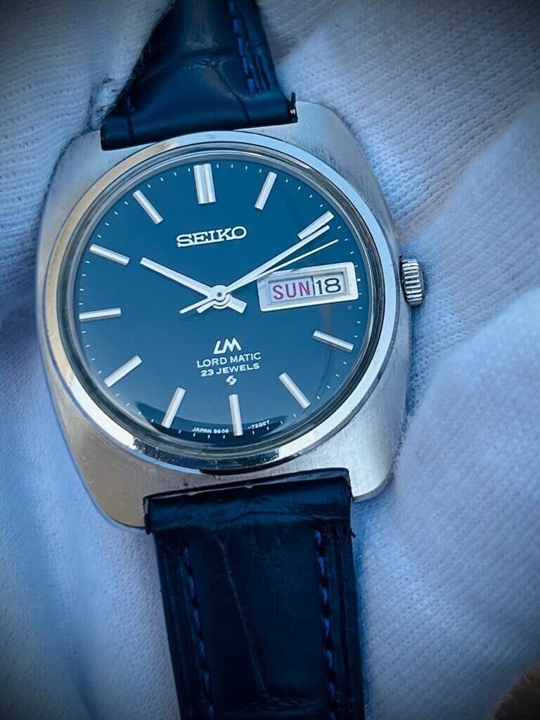 Vintage Seiko LM 23 Jewels Black Dial Automatic 5606-7130 Mens Watch, 35mm - Grab A Watch Co