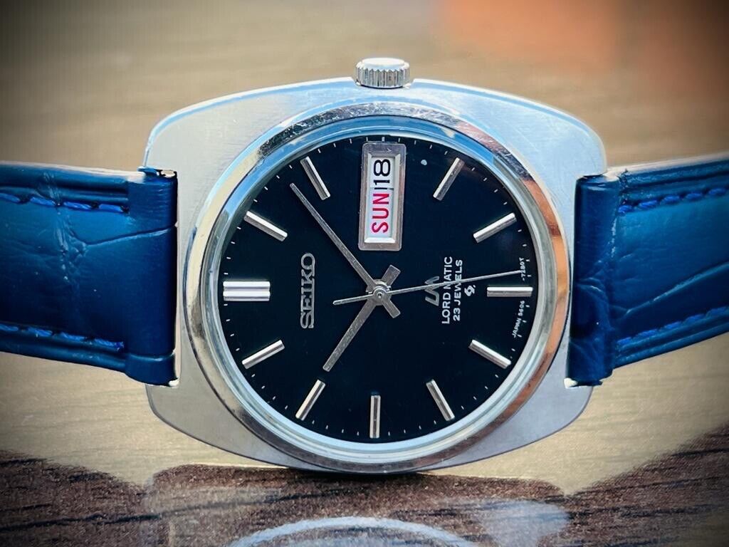 Vintage Seiko LM 23 Jewels Black Dial Automatic 5606-7130 Mens Watch, 35mm - Grab A Watch Co