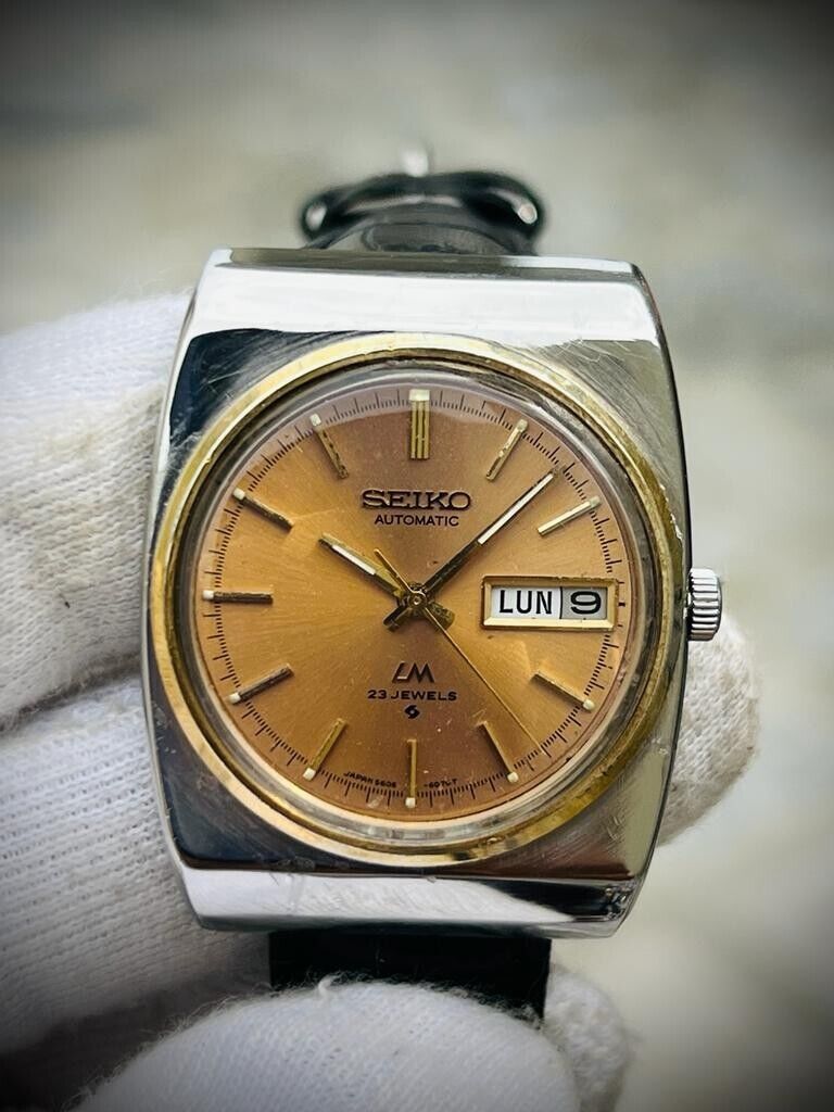 Vintage Seiko LM 23 Jewels Salmon Dial 5606-6020 Automatic Mens Watch, 33mm - Grab A Watch Co