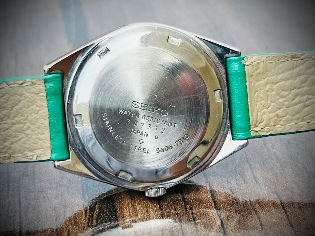 Vintage Seiko LM Eye Catching Green Dial Automatic 5606-7310 Mens Watch 37mm - Grab A Watch Co