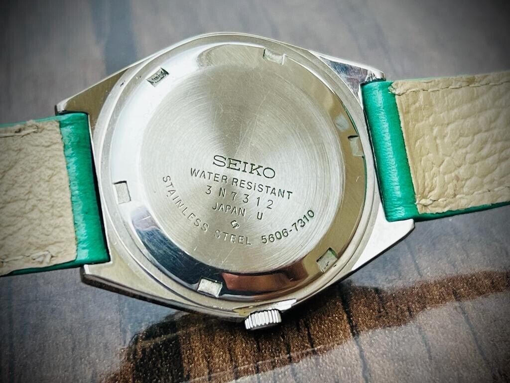 Vintage Seiko LM Eye Catching Green Dial Automatic 5606-7310 Mens Watch 37mm - Grab A Watch Co