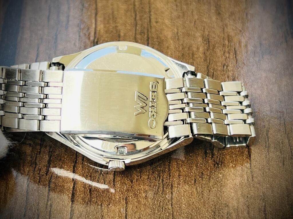 Vintage Seiko LM Red Dial 23 Jewels Automatic 5606-7320 Mens Watch 36mm, RARE - Grab A Watch Co