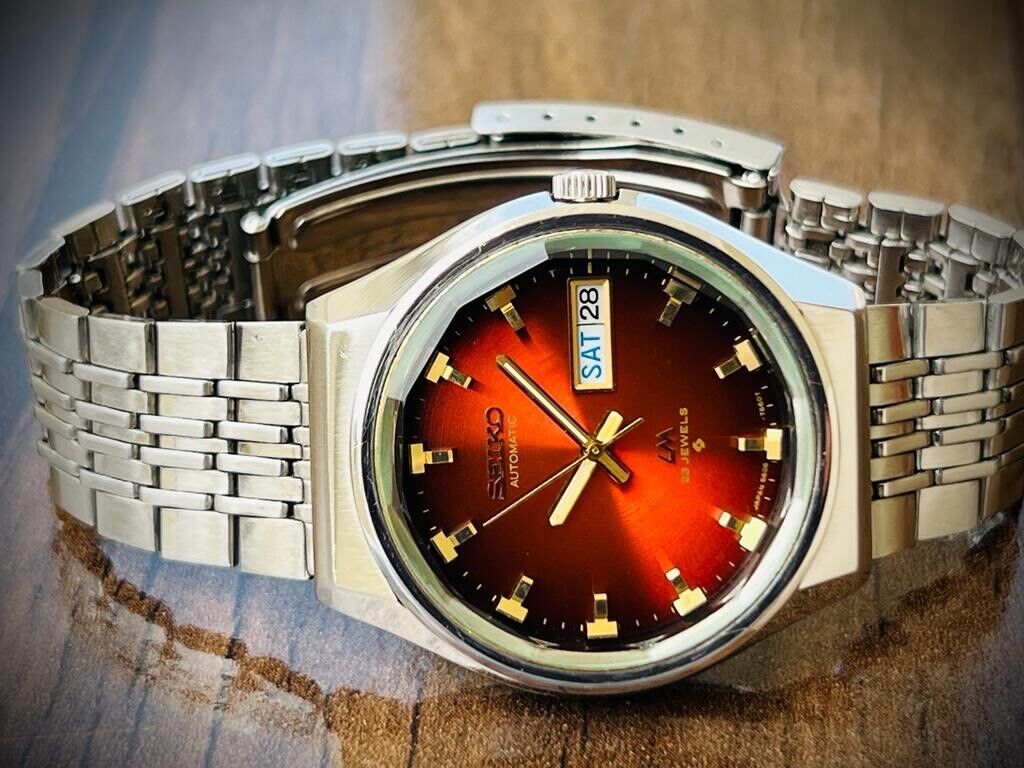 Vintage Seiko LM Red Dial 23 Jewels Automatic 5606-7320 Mens Watch 36mm, RARE - Grab A Watch Co