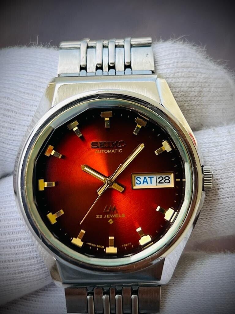 Vintage Seiko LM Red Dial 23 Jewels Automatic 5606-7320 Mens Watch 36mm, RARE - Grab A Watch Co