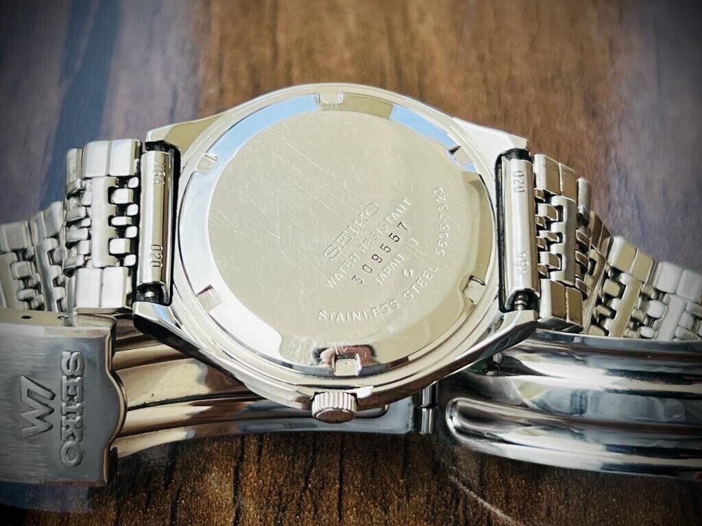 Vintage Seiko LM Red Dial 23 Jewels Automatic 5606-7320 Mens Watch 36mm, RARE - Grab A Watch Co