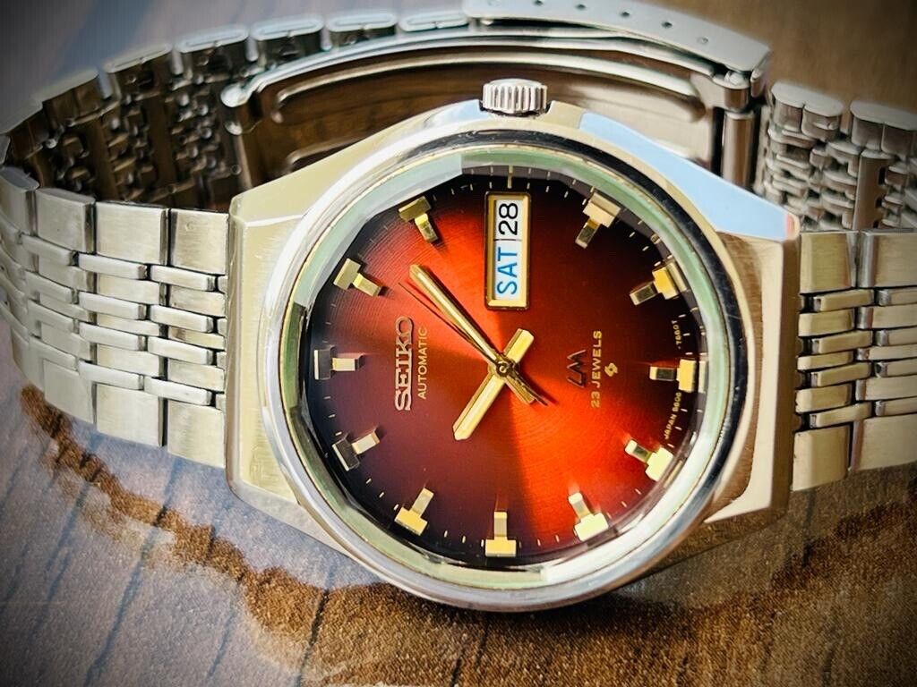 Vintage Seiko LM Red Dial 23 Jewels Automatic 5606-7320 Mens Watch 36mm, RARE - Grab A Watch Co