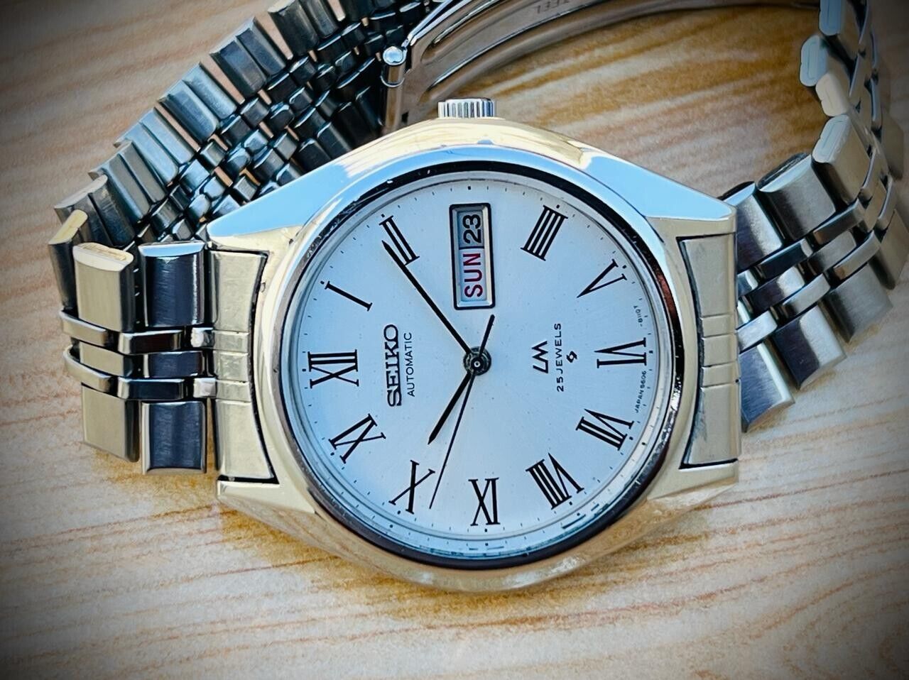 Vintage Seiko LM Automatic 25 Jewels Roman Dial 5606-8031 Mens Watch 38mm