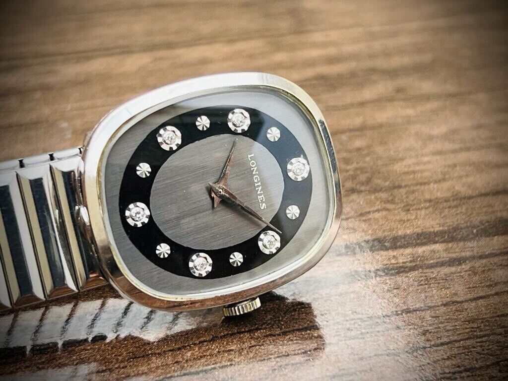 Vintage Longines Black diamond Dial Ladies Manual Winding Swiss Made 28mm, RARE - Grab A Watch Co